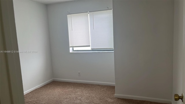 view of carpeted empty room