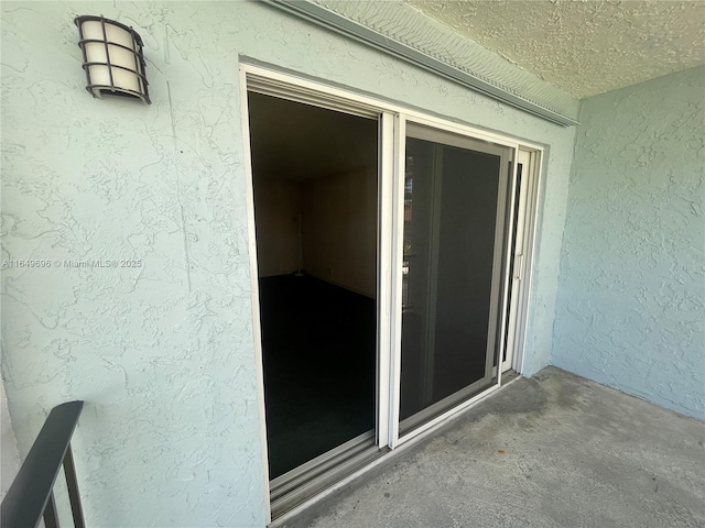 3000 NE 5th Ter Unit 310-A, Wilton Manors, FL 33334 - property entrance featuring stucco siding