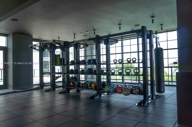 workout area with tile patterned floors