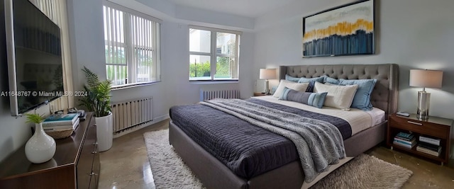 bedroom with radiator heating unit