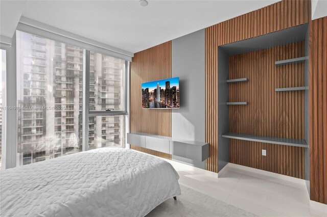 bedroom featuring expansive windows