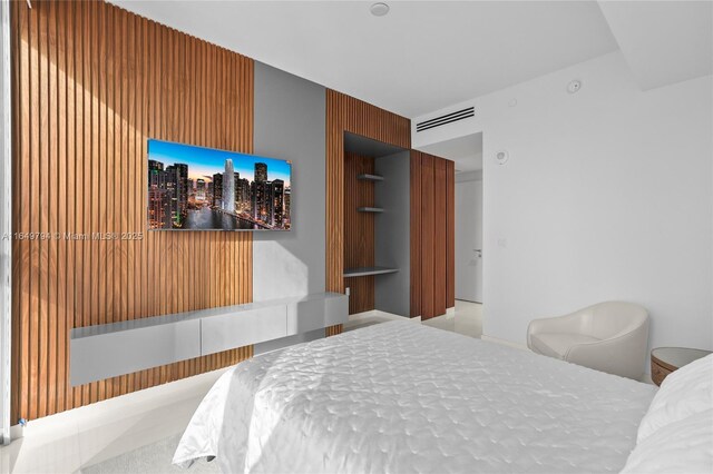 interior space featuring a wealth of natural light, a wall of windows, and vanity