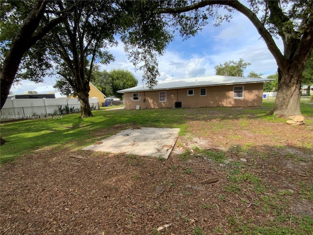 rear view of house with a patio area