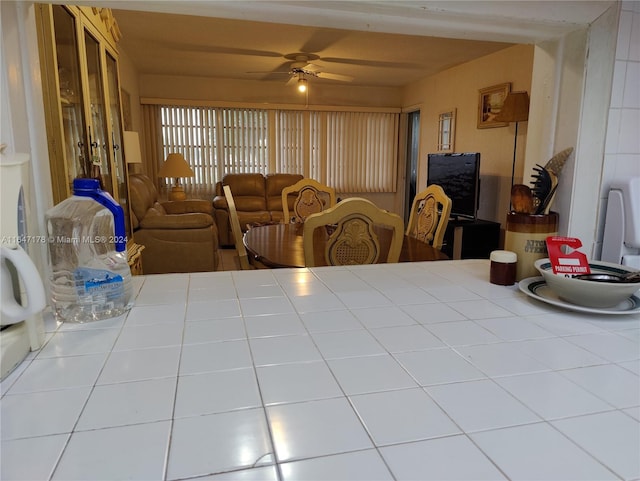 dining room featuring ceiling fan