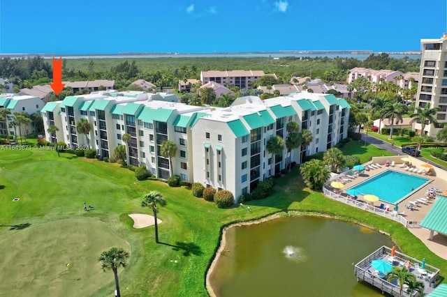 drone / aerial view with a water view