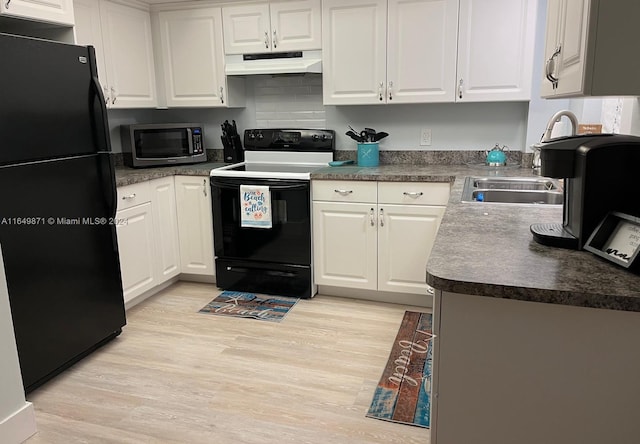 kitchen featuring black appliances, white cabinetry, and light hardwood / wood-style flooring