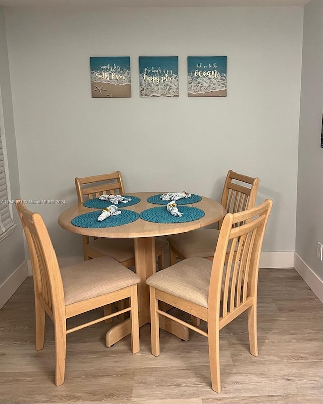 dining room featuring light hardwood / wood-style flooring