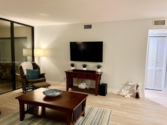 living room featuring light hardwood / wood-style flooring