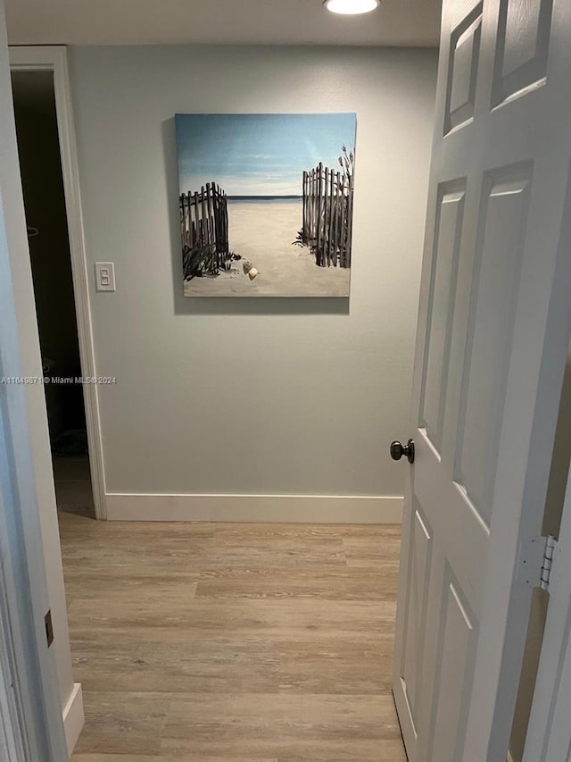 corridor featuring light wood-type flooring