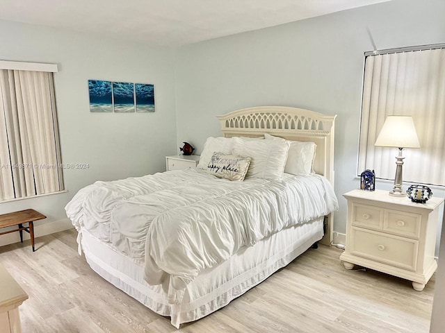 bedroom with light wood-type flooring