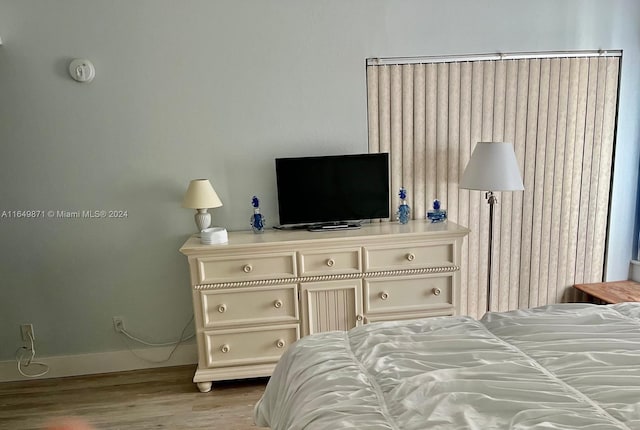 bedroom with light hardwood / wood-style floors