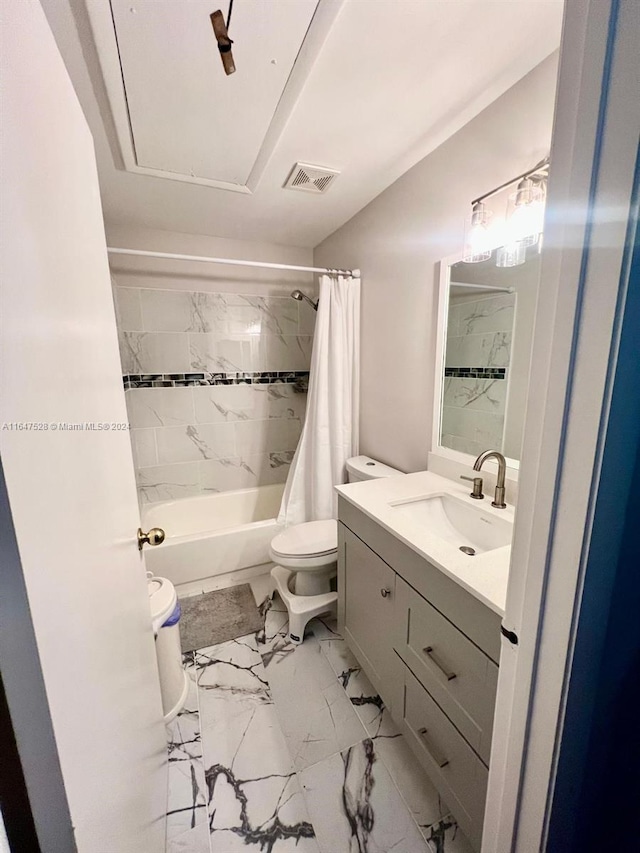 full bathroom with tile patterned floors, shower / bath combo, toilet, and vanity