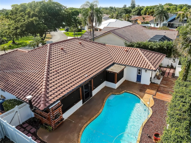 view of swimming pool featuring a patio area