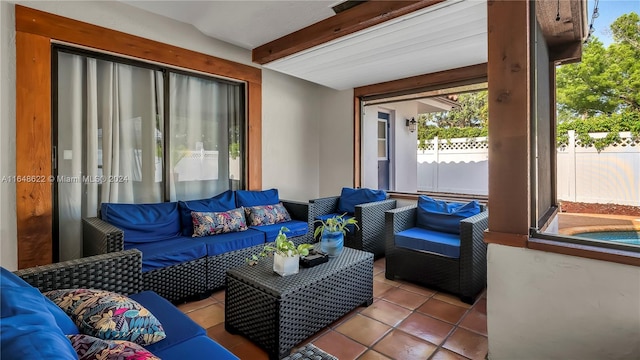 tiled living room with beamed ceiling