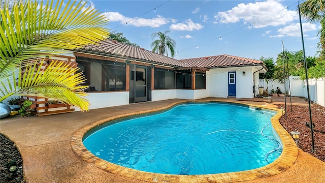 view of pool featuring a patio