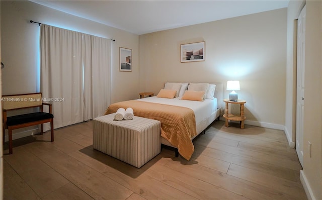 bedroom featuring light hardwood / wood-style floors