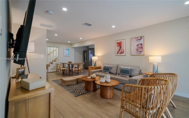 living room with hardwood / wood-style floors