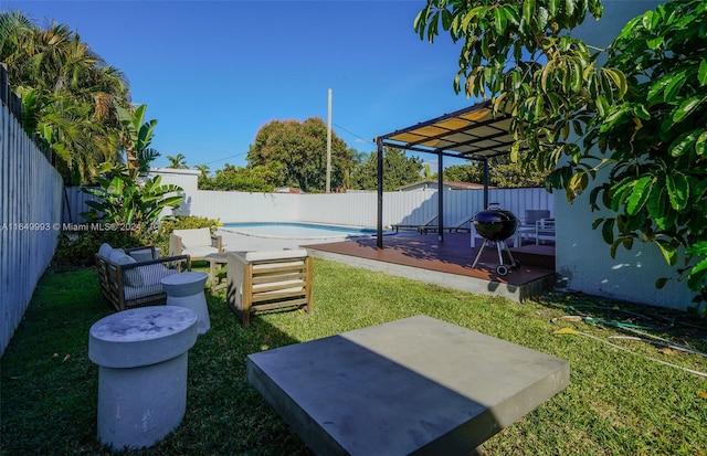 view of yard featuring a swimming pool side deck