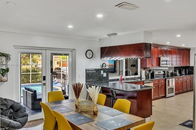 2210 N 54th Ave, Hollywood, FL 33021 - dining area featuring recessed lighting and crown molding