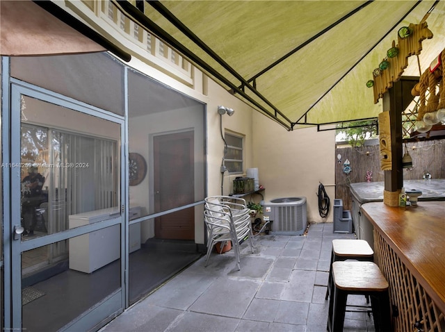 view of patio featuring central air condition unit