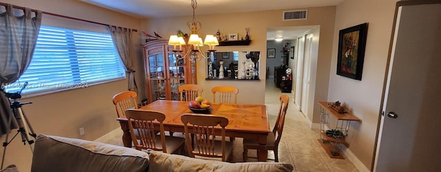 dining room featuring a chandelier