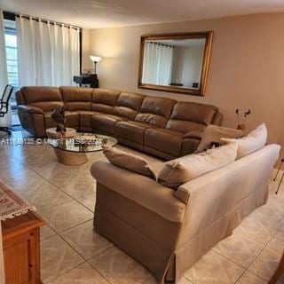 living room featuring light tile patterned floors