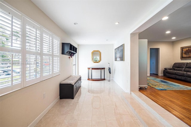 corridor featuring light hardwood / wood-style flooring