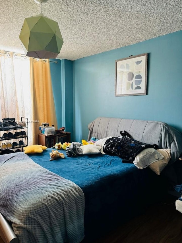 bedroom with a textured ceiling