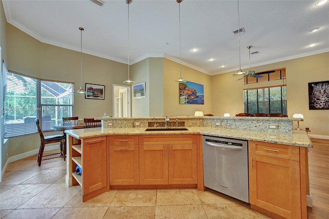 kitchen featuring ceiling fan, plenty of natural light, sink, and stainless steel dishwasher