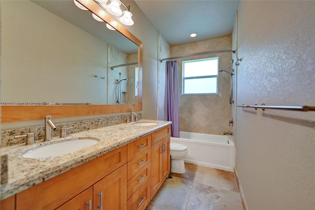 full bathroom featuring vanity, toilet, and shower / bath combo