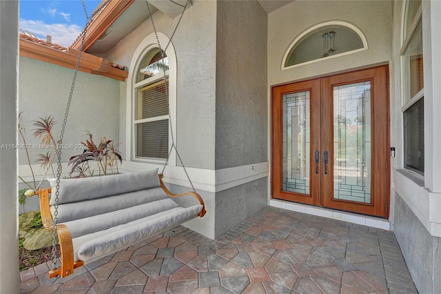 view of exterior entry with french doors