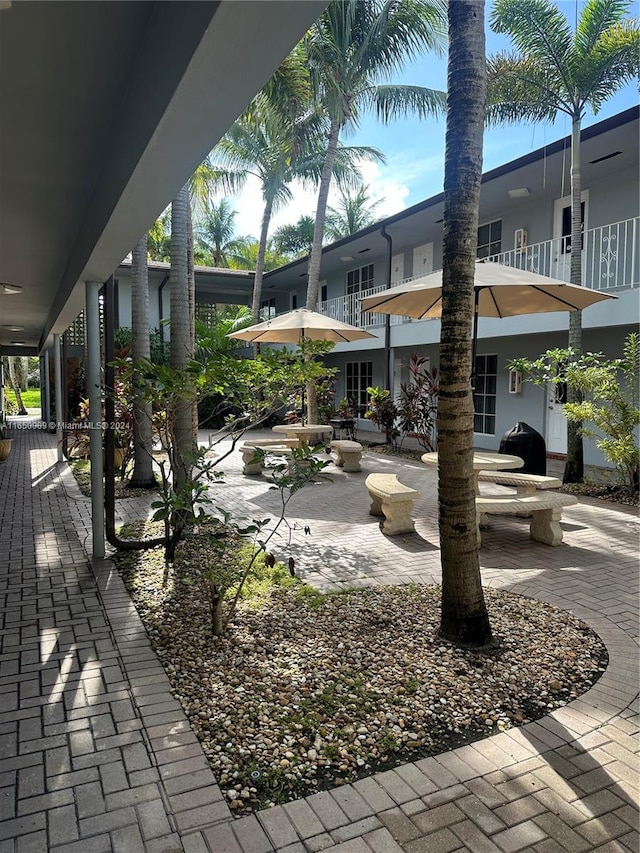 view of home's community featuring a patio