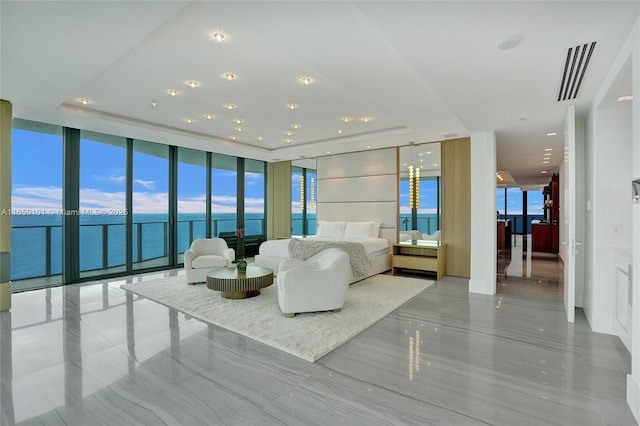 19575 Collins Ave Unit 33, Sunny Isles Beach, FL 33160 - building lobby featuring expansive windows, a water view, and recessed lighting