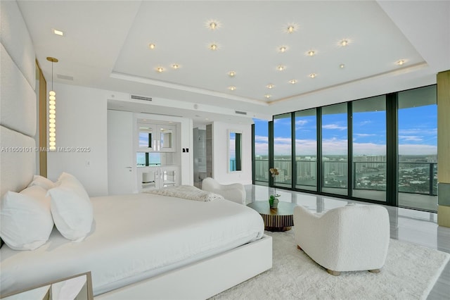 19575 Collins Ave Unit 33, Sunny Isles Beach, FL 33160 - bedroom featuring a tray ceiling and access to outside