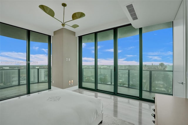 19575 Collins Ave Unit 33, Sunny Isles Beach, FL 33160 - tiled bedroom with floor to ceiling windows and access to exterior