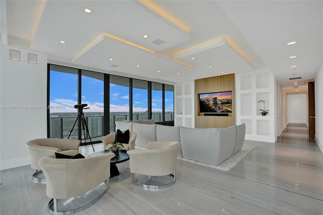 19575 Collins Ave Unit 33, Sunny Isles Beach, FL 33160 - living room featuring a wall of windows and built in shelves