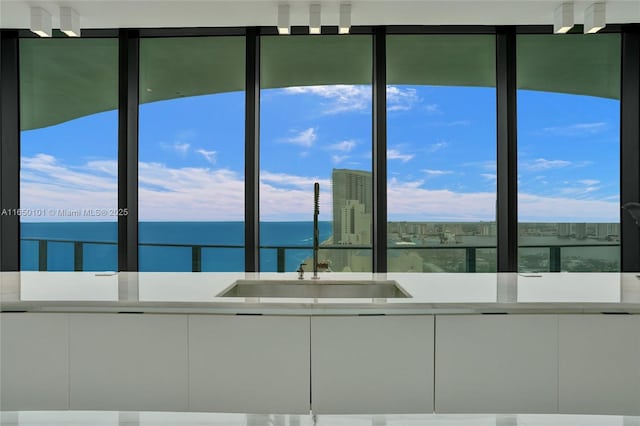 19575 Collins Ave Unit 33, Sunny Isles Beach, FL 33160 - bathroom with a sink and a water view