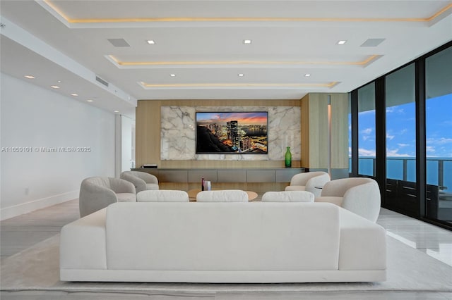 19575 Collins Ave Unit 33, Sunny Isles Beach, FL 33160 - cinema room featuring baseboards, a raised ceiling, and recessed lighting