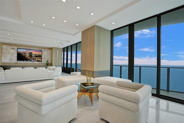 19575 Collins Ave Unit 33, Sunny Isles Beach, FL 33160 - living area featuring a wall of windows, a water view, and light tile patterned floors