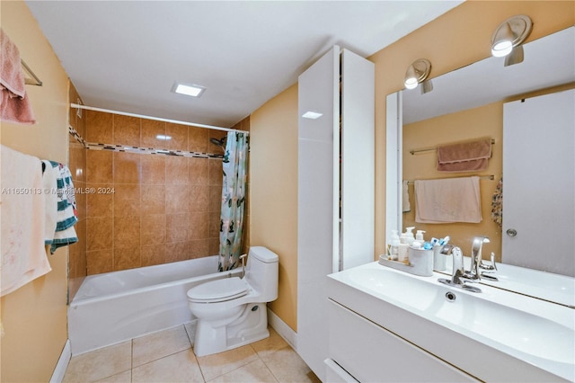 full bathroom featuring vanity, toilet, tile patterned floors, and shower / bathtub combination with curtain