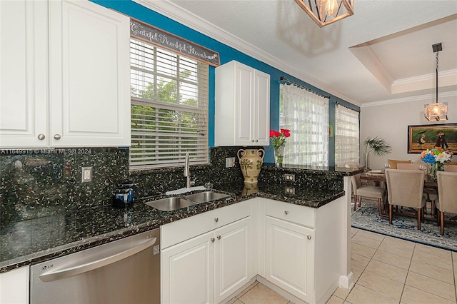 kitchen with dishwasher, sink, decorative light fixtures, and white cabinets