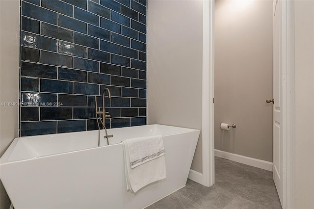 bathroom featuring a tub to relax in