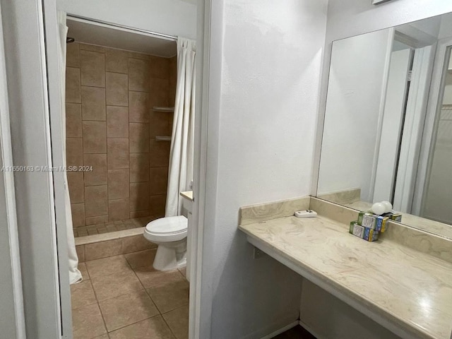 bathroom with walk in shower, toilet, and tile patterned floors