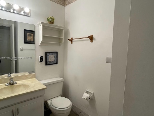 2510 SW 81st Ave Unit 405, Davie, FL 33324 - half bathroom featuring toilet, vanity, and baseboards