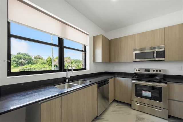 6159 SW 36th Ct, Miramar, FL 33023 - kitchen featuring stainless steel appliances, a sink, light marble finish floors, and modern cabinets