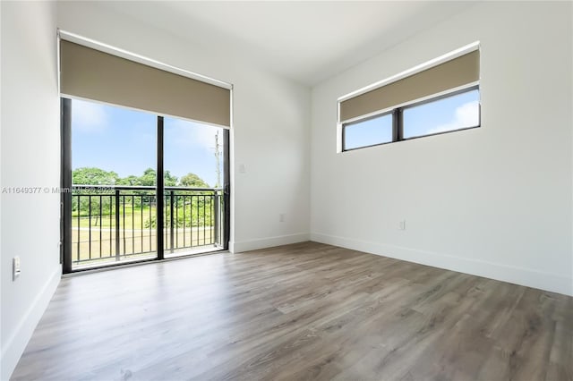 6159 SW 36th Ct, Miramar, FL 33023 - unfurnished room featuring baseboards and wood finished floors