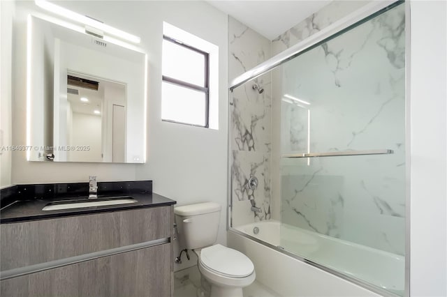 6159 SW 36th Ct, Miramar, FL 33023 - full bath featuring vanity, toilet, shower / bath combination with glass door, and marble look tiles