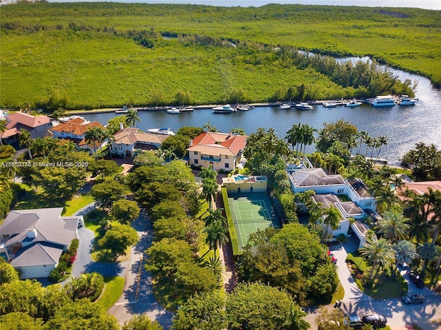 aerial view featuring a water view and a residential view