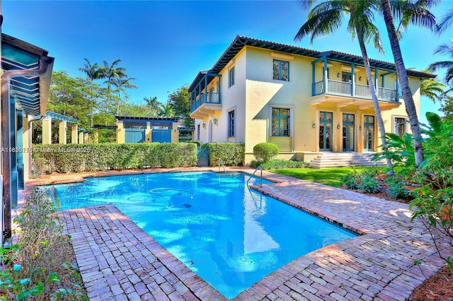 view of swimming pool with a fenced in pool