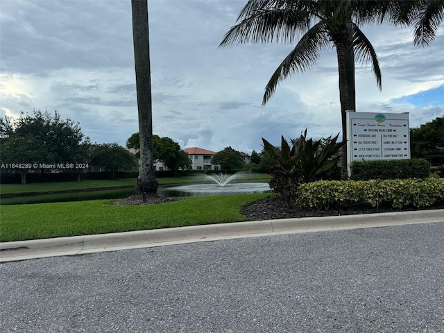 view of street with curbs